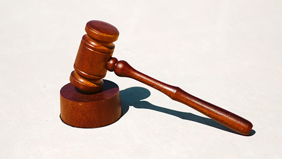 a wooden gavel; image used for blog post about tax rules of court awards and settlements