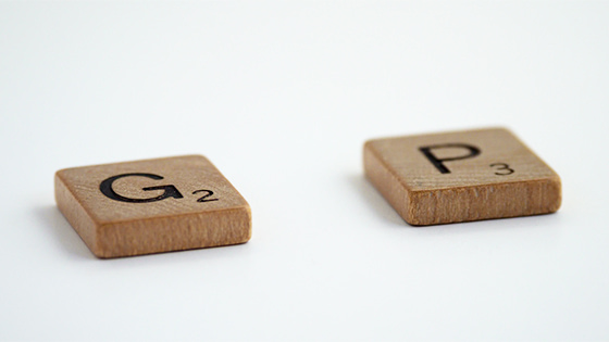 two scrabble tiles of G and P lie on a flat surface; image used for blog post about not-for-profit internal controls gaps
