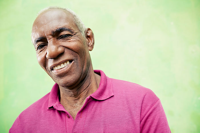 male smiling after a dental implant operation
