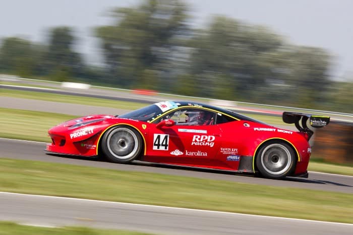 Race car with company branding to illustrate marketing and advertising expense