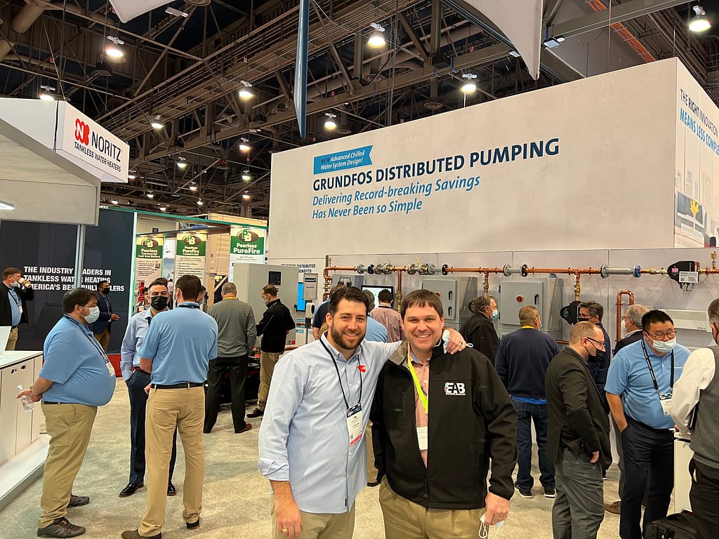 Tim Zacharias with Cougar USA at the GRUNDFOS booth at the 2022 ASHRAE Winter Conference and AHR Expo.