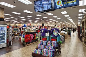 Interior of a Buc-ee's store with various merchandise and colorful t-shirts