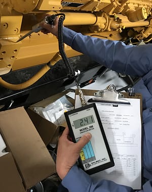 EAB engineer performing generator vibrator testing