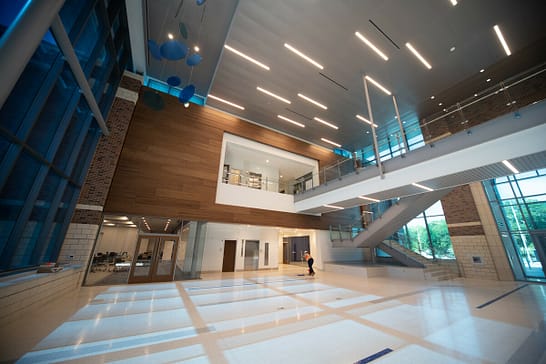 Spacious, modern interior of Andrea-Mennen Welcome Center at Collin College McKinney Campus