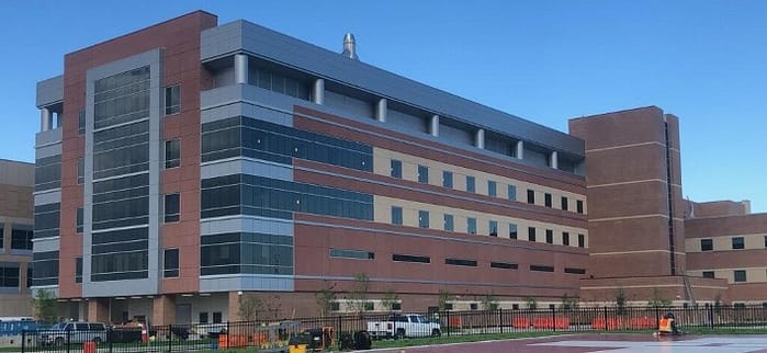 Exterior view of UTMB League City Hospital Bed Tower Expansion building with new clinical floors and upgraded emergency power systems
