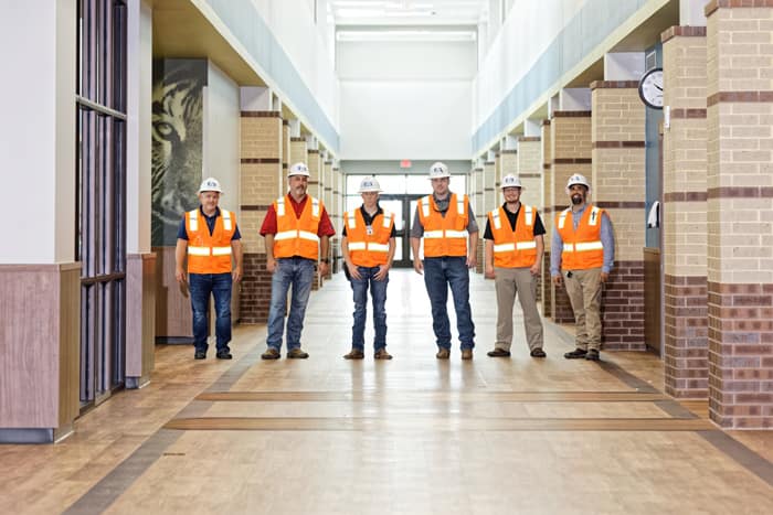 EAB testing and balancing team inside a commercial building during hvac system inspection