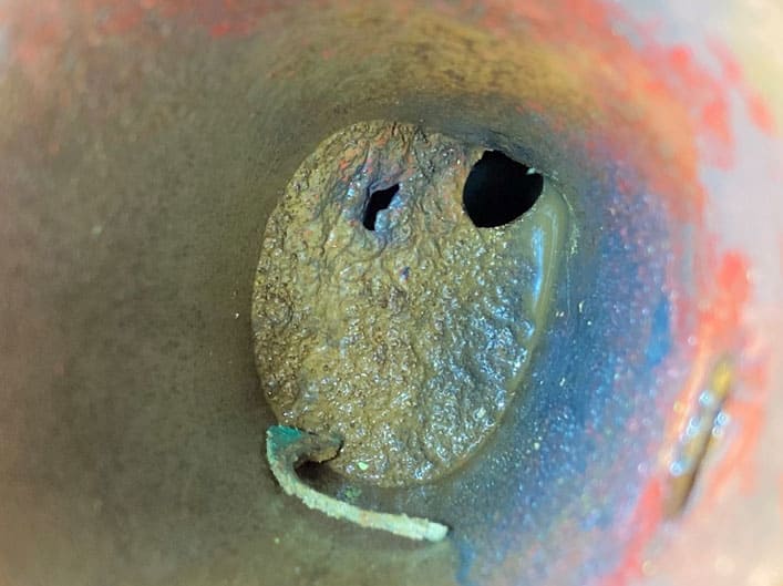 metal obstruction on discharge pump