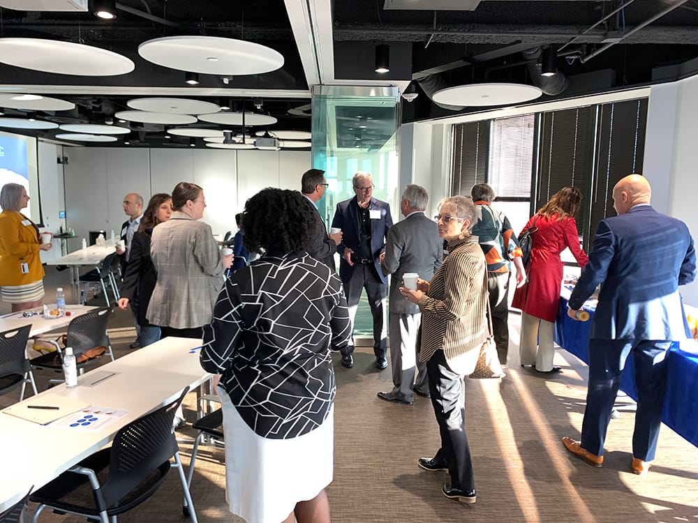 A photo of standing and talking for the PKF Texas seminar, "2022 Accounting and Tax Updates and Changes for Not-for-Profits""