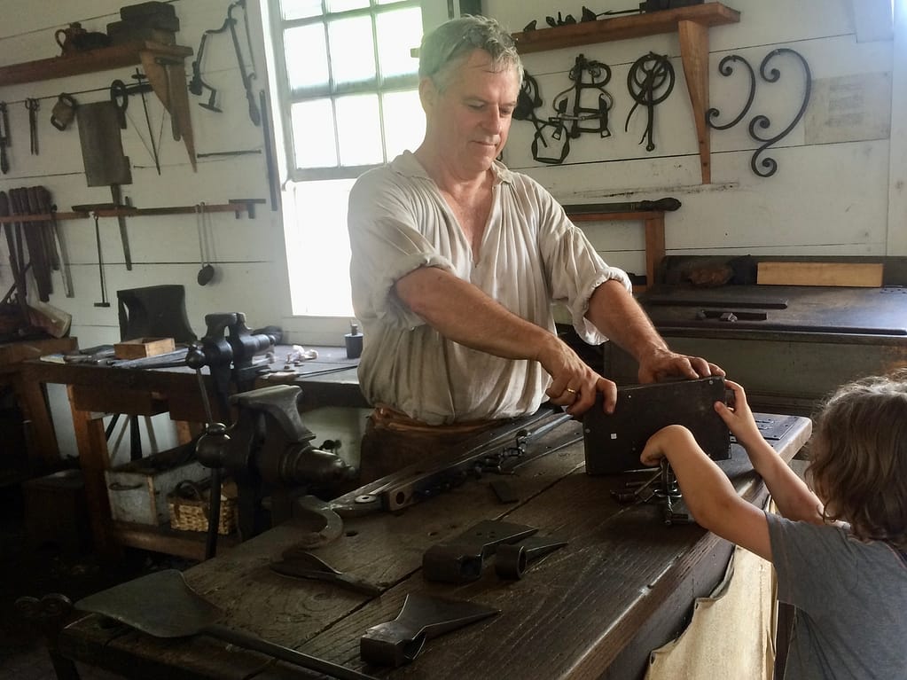 Learning how to use old tools at living history museums