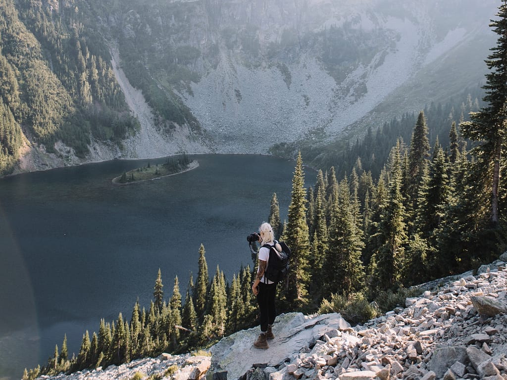 Lady taking a picture in North Cascades National Park