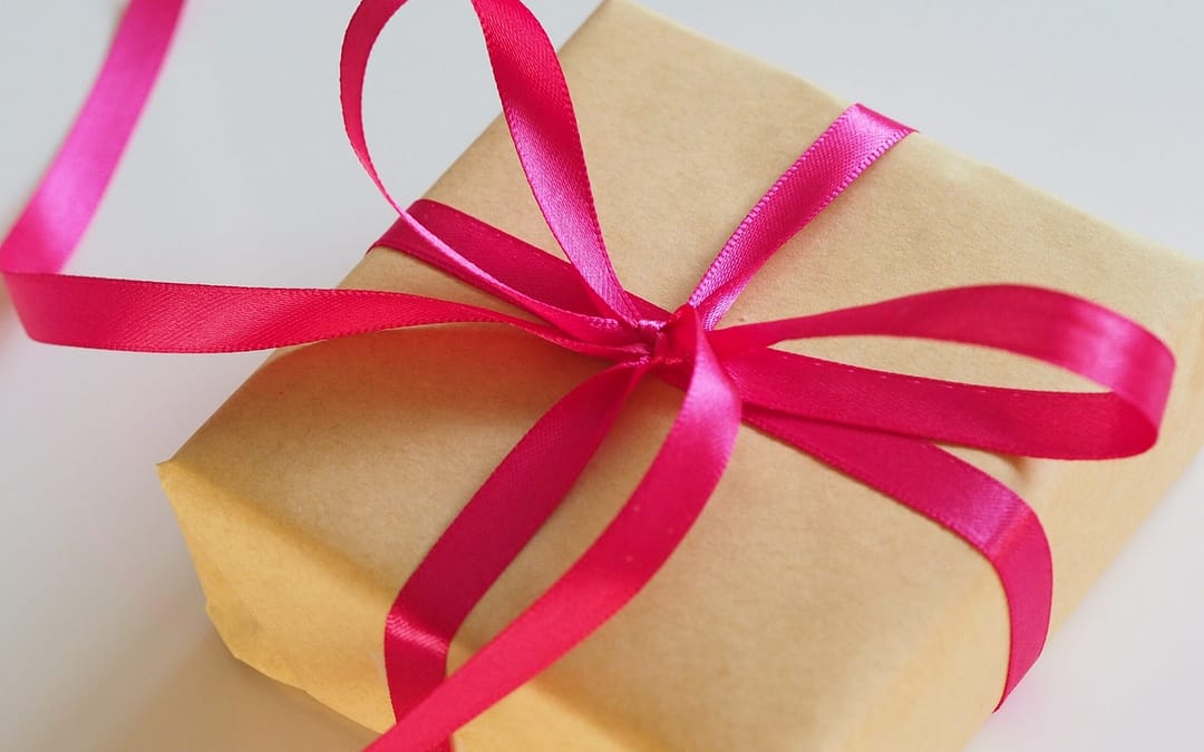 Gift box with a bow containing Black Friday deal