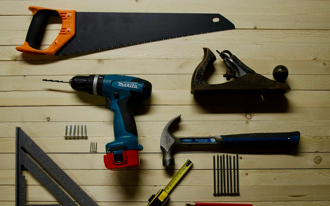 Tools laid out on wood table, perfect for RV upgrades