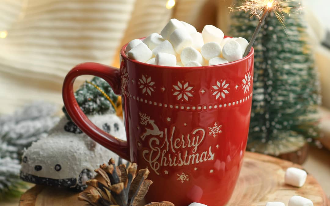Hot cocoa in Christmas mug: a great addition to Christmas camping