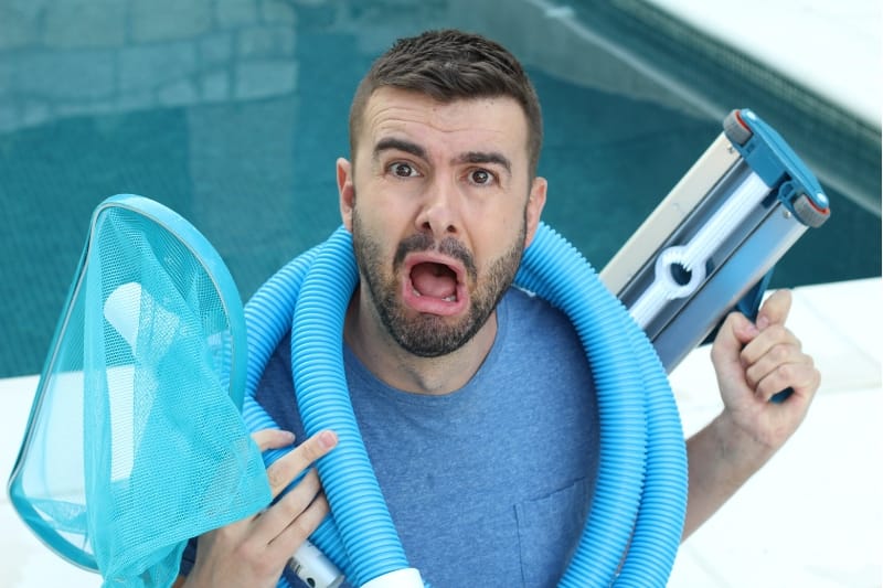 man frustrated with swimming pool problems