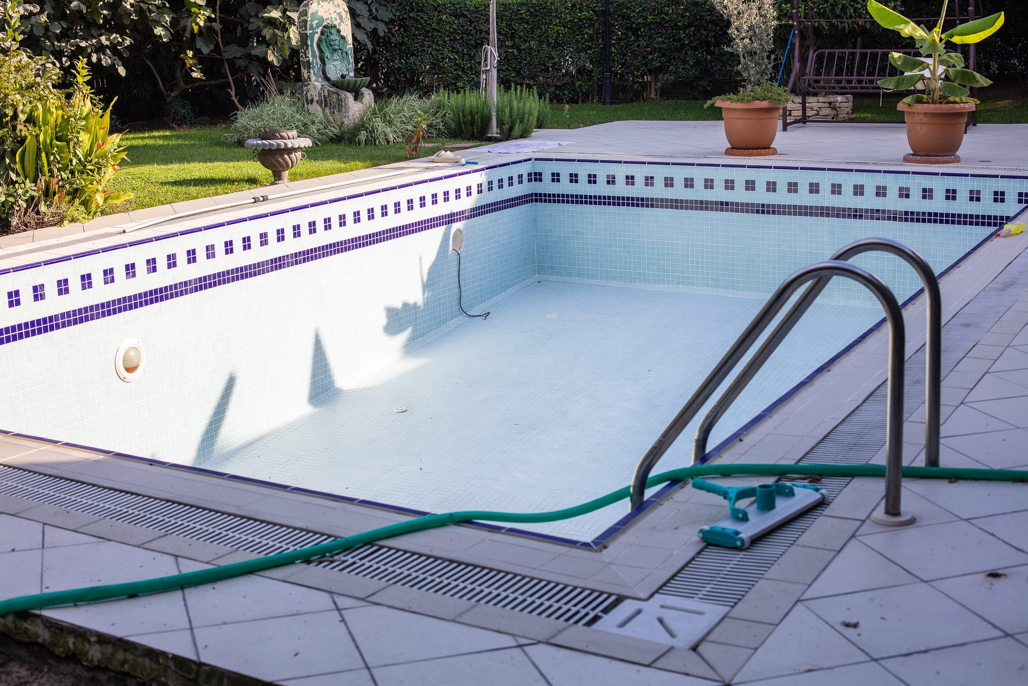 empty swimming pool undergoing a replastering process