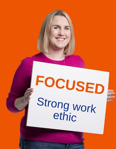 Approachable Advisor Holding Focus Sign