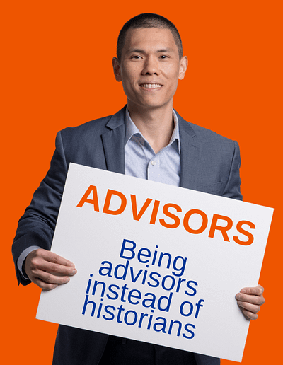 Approachable Advisor Holding Advisors Sign