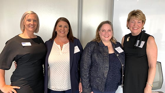 A photo of four women posing together for PKF Texas’ not-for-profit seminar on May 19, 2022.