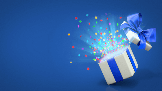 An image of a gift box opening with confetti exploding; for blog post about 2022 gift tax return deadline