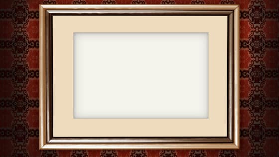 an empty gold and wooden picture frame; image used for blog post about donating art to charity tax rules