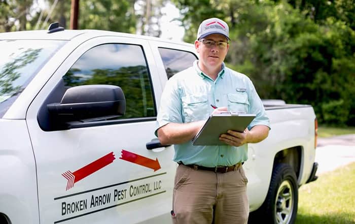 Pest Inspection specialist holding a checklist