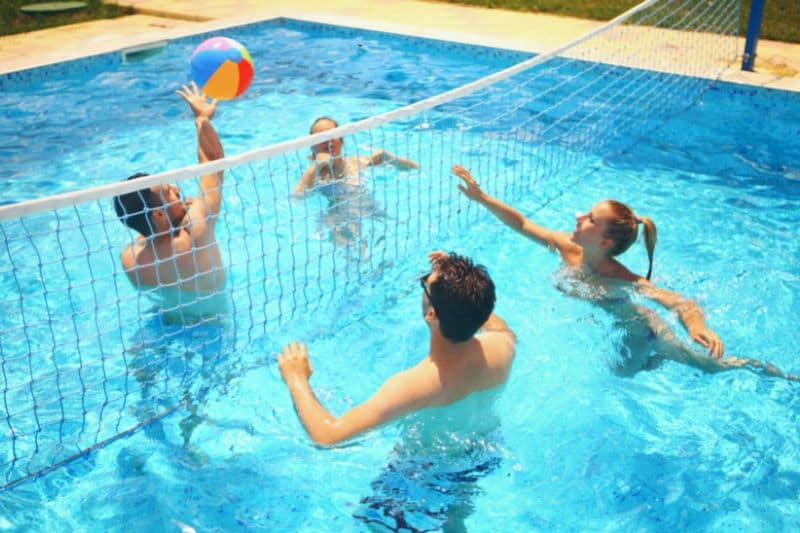people playing in the pool