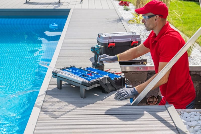 worker performing pool maintenance