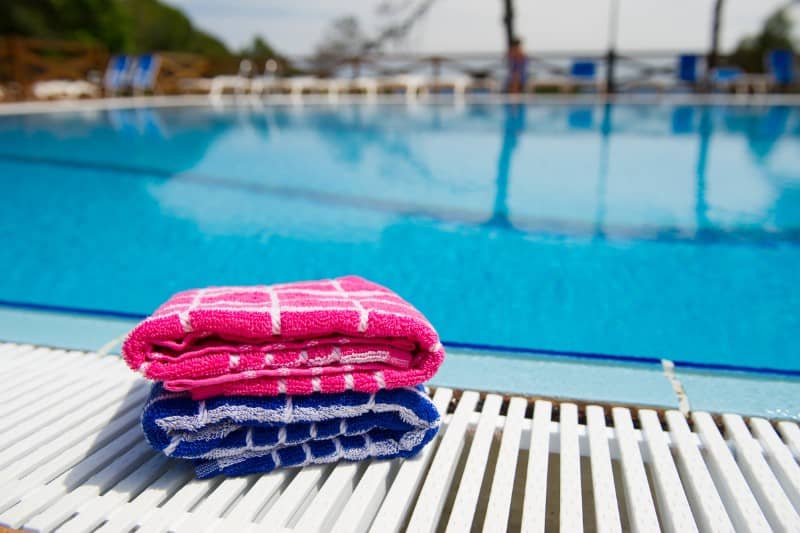 towels near a swimming pool