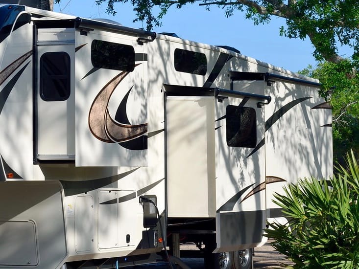 3 RV slide toppers on fifth wheel